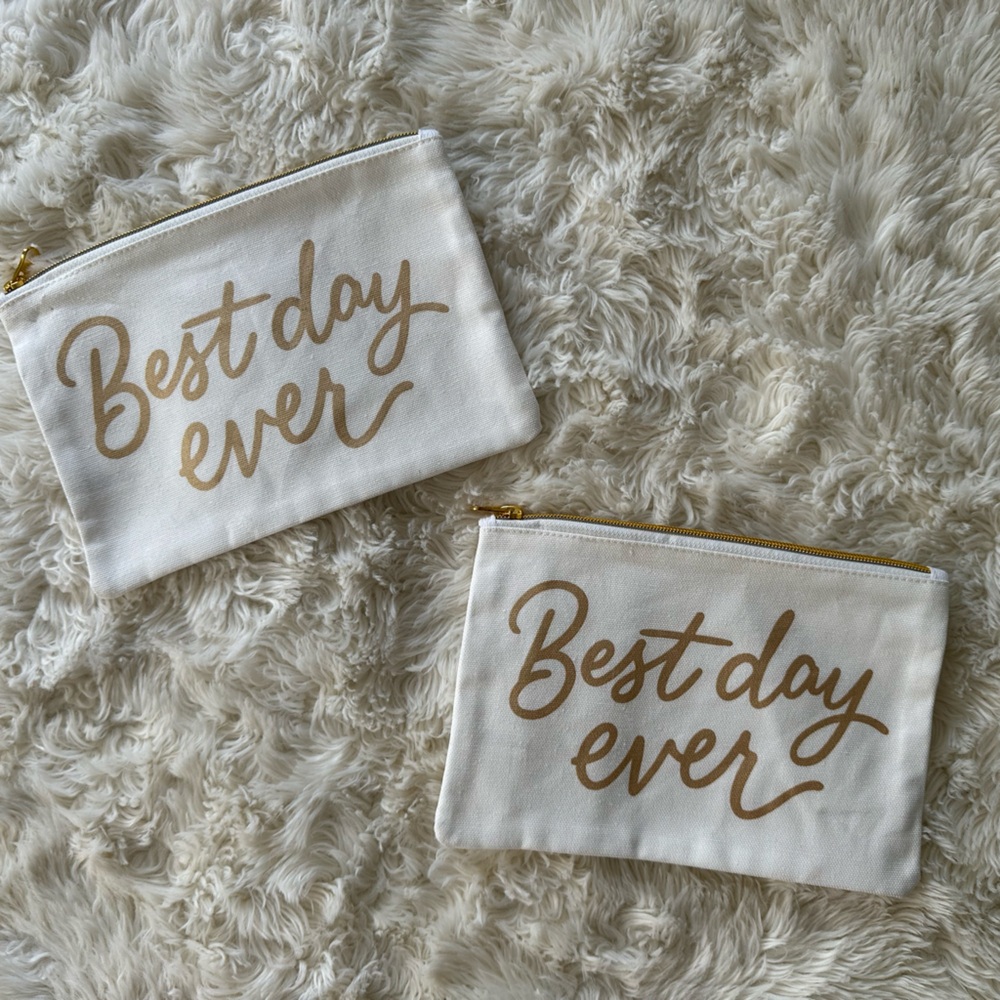Chic White Pouches with Gold Script